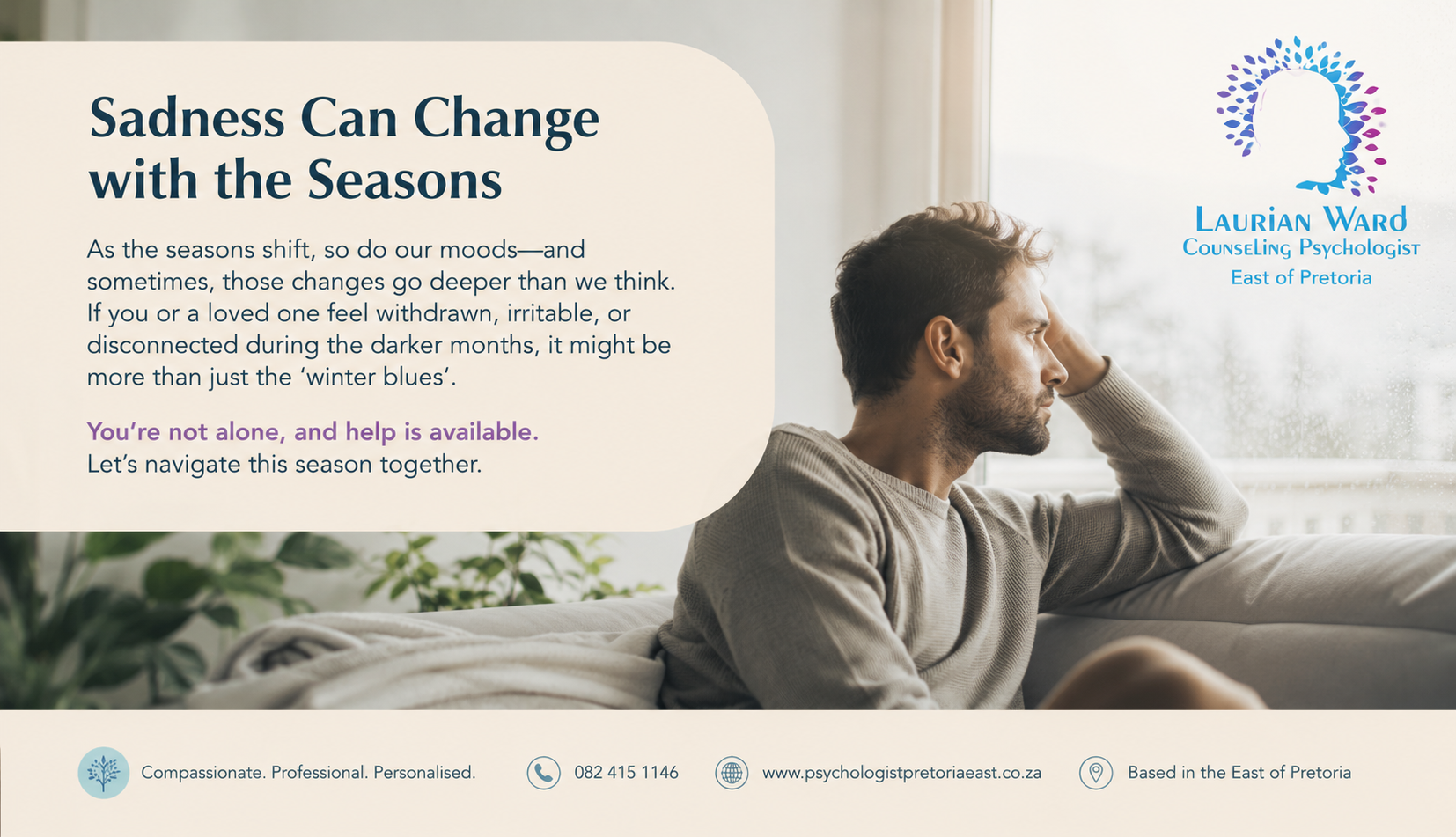 a man sitting on a couch starring in to the garden because of seasonal sadness